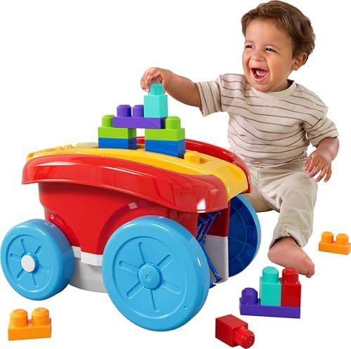 Red block scooping wagon collecting toddler building blocks