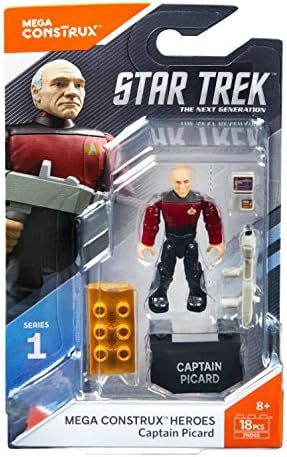 Captain Picard micro figure holding phaser and PADD