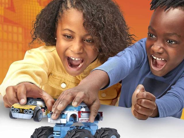 Kids building a MEGA Hot Wheels monster truck