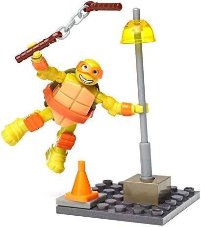 Mikey training with nunchucks at buildable streetlamp