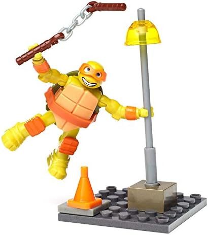 Mikey training with nunchucks at buildable streetlamp